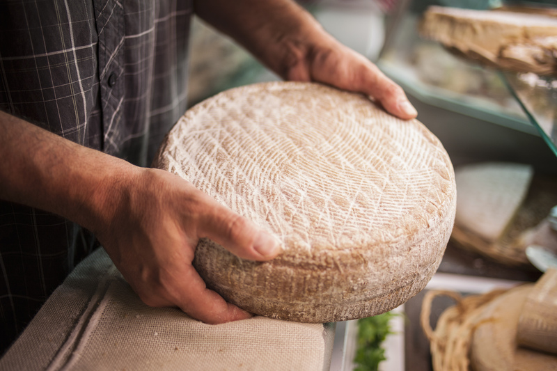 Illustration du métier de fromager.